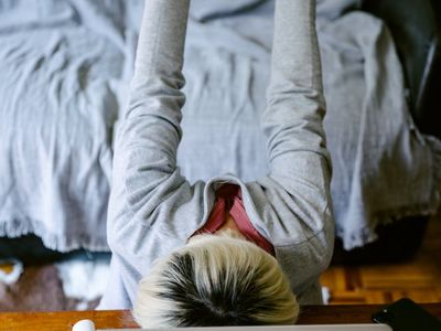 Woman working at desk with proper posture